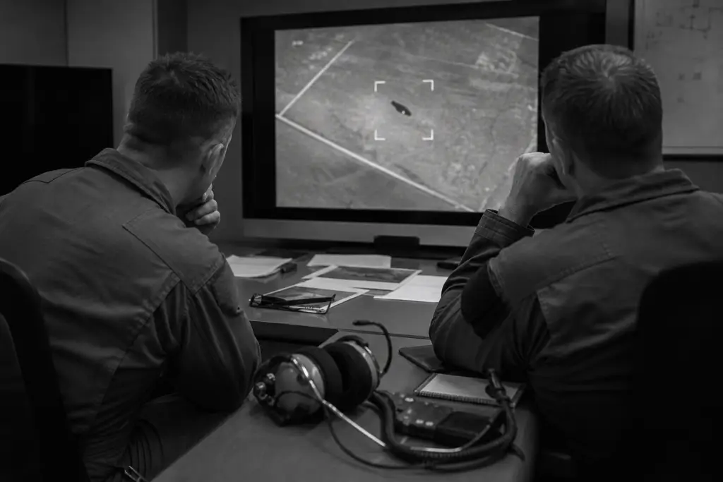 Military Aircrew Reviewing an Unidentified Contact