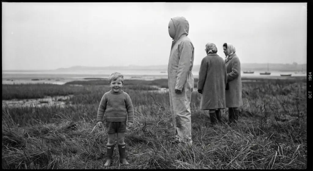 Solway Firth family photo with suited figure